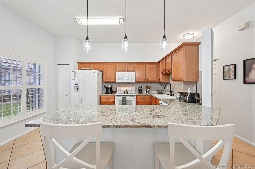 Photo of 621 NW Broken Oak Trail, Jensen Beach, FL 34957 (MLS # M20054782)