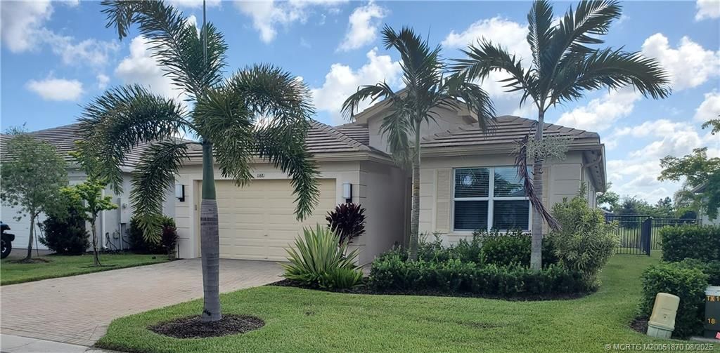 Photo of 11681 SW Oceanus Boulevard, Port Saint Lucie, FL 34987 (MLS # M20051870)