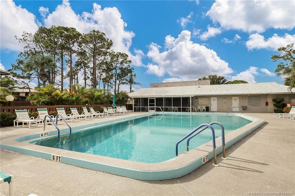 Photo of 1503 SE Excaliber Lane #C, Port Saint Lucie, FL 34952 (MLS # M20041998)