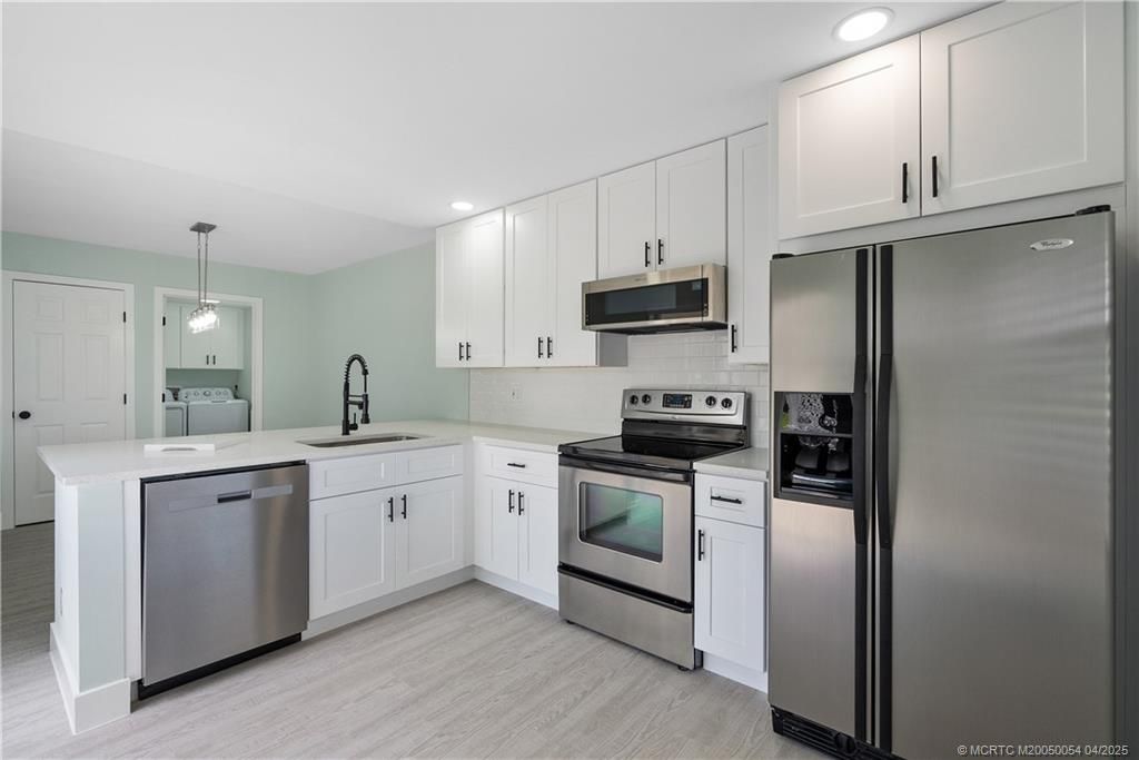 Photo of 2464 SW Danbury Lane, Palm City, FL 34990 (MLS # M20050054)