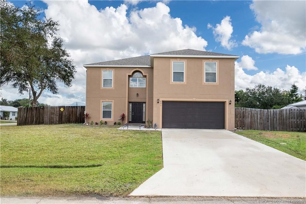 Photo of 601 SW Empire Street, Port Saint Lucie, FL 34983 (MLS # M20048161)