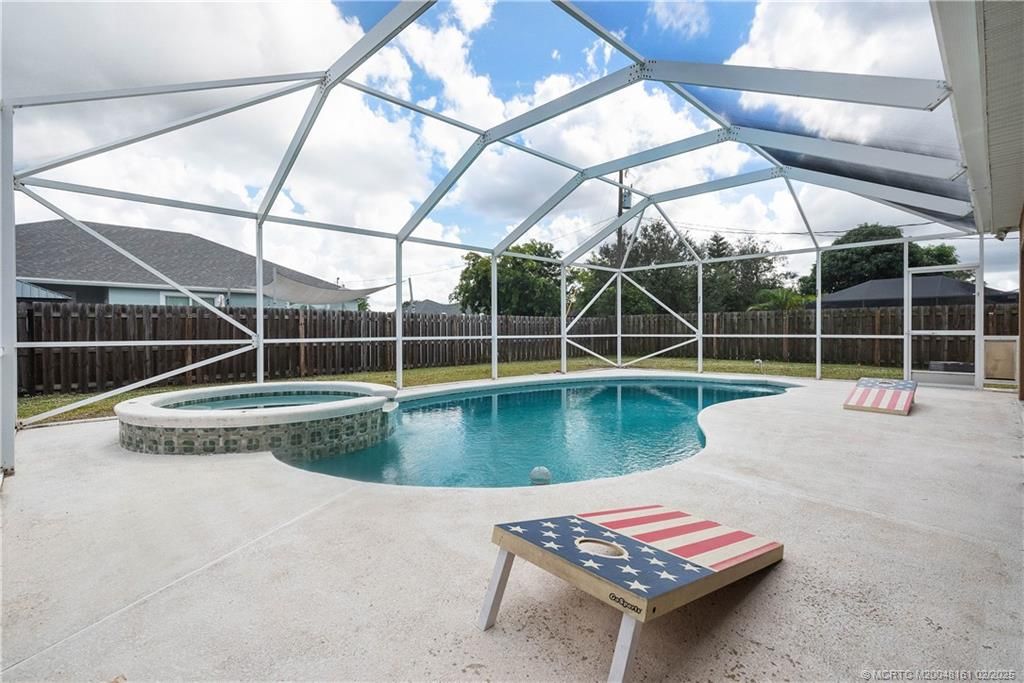Photo of 601 SW Empire Street, Port Saint Lucie, FL 34983 (MLS # M20048161)