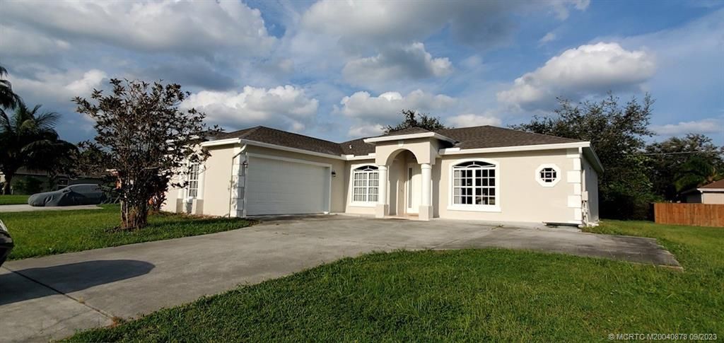 Photo of 249 NW Bayshore Boulevard, Port Saint Lucie, FL 34983 (MLS # M20040878)