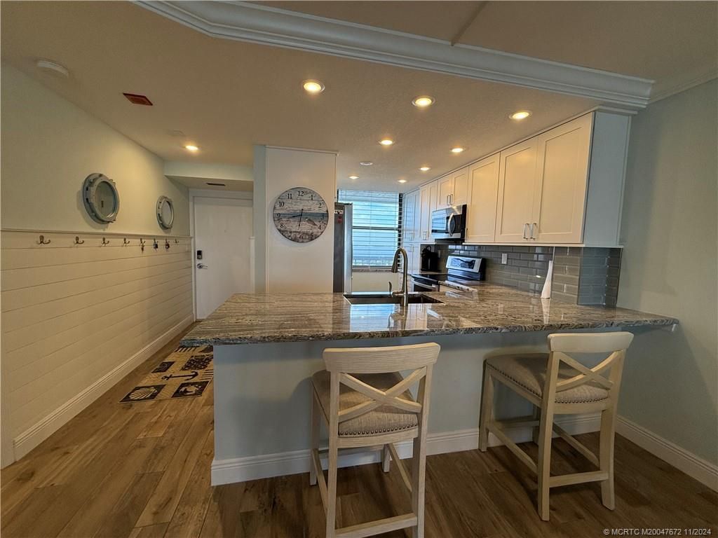 Photo of 10600 S Ocean Drive #1205, Jensen Beach, FL 34957 (MLS # M20047672)