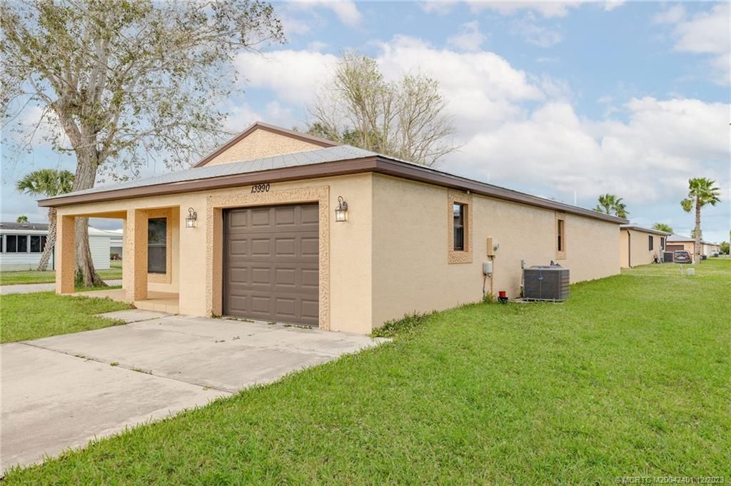 Photo of 13990 Cancun Avenue, Fort Pierce, FL 34951 (MLS # M20042401)