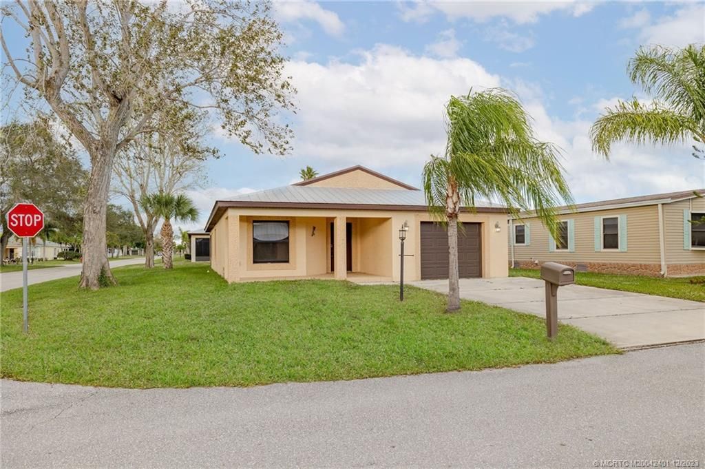 Photo of 13990 Cancun Avenue, Fort Pierce, FL 34951 (MLS # M20042401)