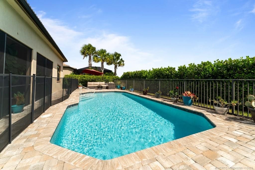 Photo of 106 Blanca Isles Lane, Jupiter, FL 33478 (MLS # M20041785)