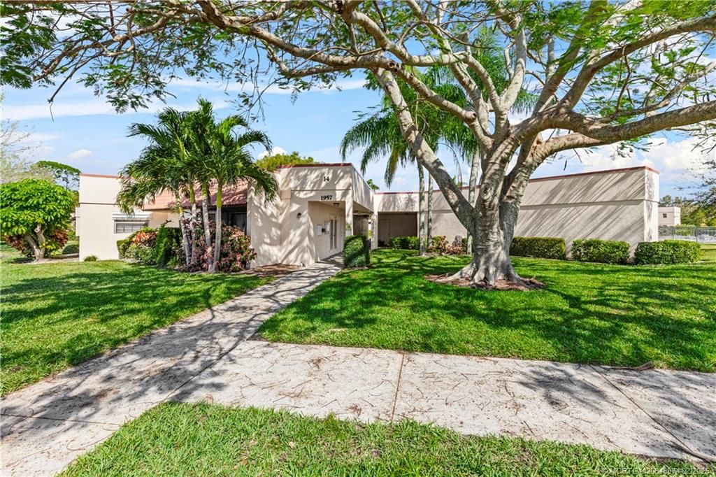 Photo of 1957 NE Collins Circle #14-20, Jensen Beach, FL 34957 (MLS # M20048974)