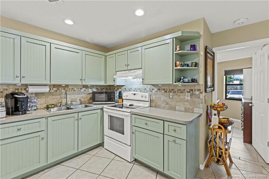 Photo of 1957 NE Collins Circle #14-20, Jensen Beach, FL 34957 (MLS # M20048974)