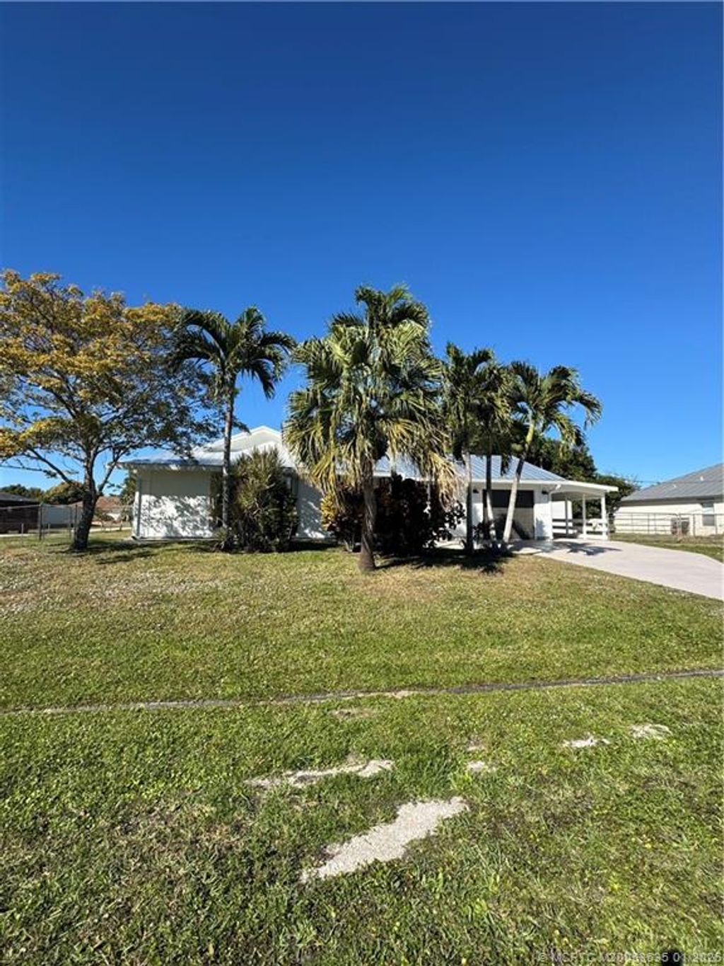 Photo of 981 SW Bay State Road, Port Saint Lucie, FL 34953 (MLS # M20053635)