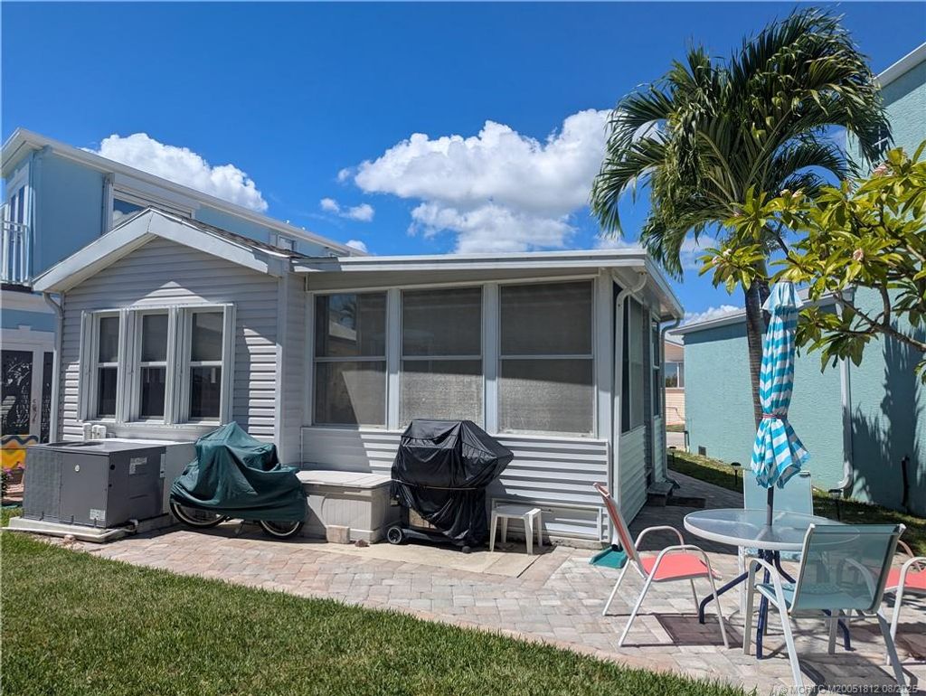 Photo of 1277 Nettles Boulevard, Jensen Beach, FL 34957 (MLS # M20051812)