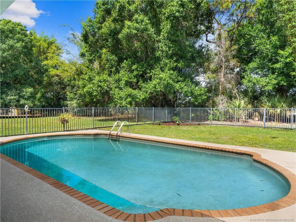 Photo of 2055 SW Danforth Circle, Palm City, FL 34990 (MLS # M20050636)