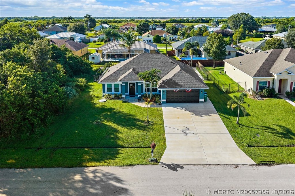 Photo of 180 SW Felix Avenue, Port Saint Lucie, FL 34953 (MLS # M20057356)