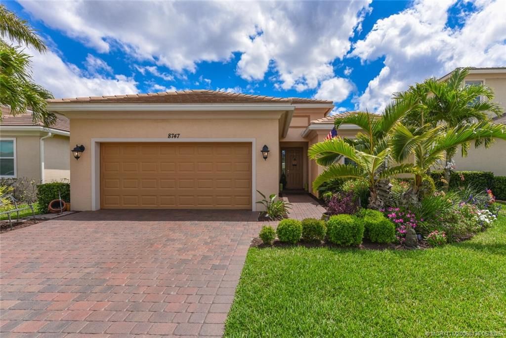 Photo of 8747 SW Vico Way, Port Saint Lucie, FL 34987 (MLS # M20050136)
