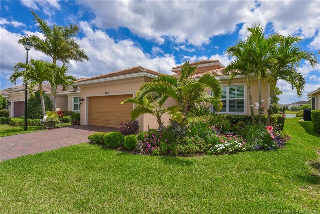 Photo of 8747 SW Vico Way, Port Saint Lucie, FL 34987 (MLS # M20050136)