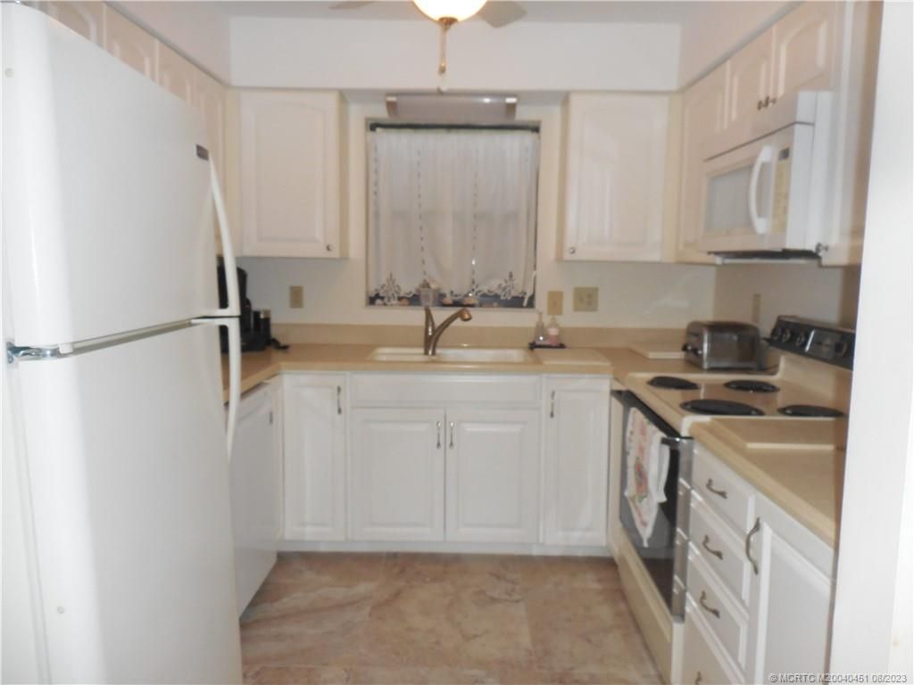 Photo of 911 SW South River Drive #105, Stuart, FL 34997 (MLS # M20040451)