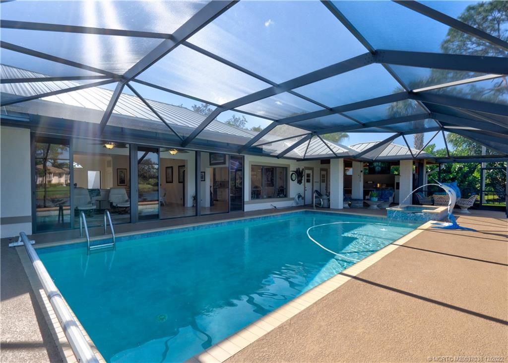 Photo of 1313 SW Troon Circle, Palm City, FL 34990 (MLS # M20037038)