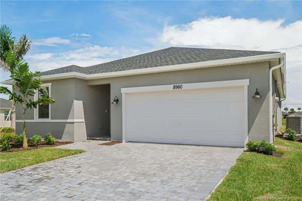 Photo of 8960 Dahlia Circle, Port Saint Lucie, FL 34986 (MLS # M20046605)