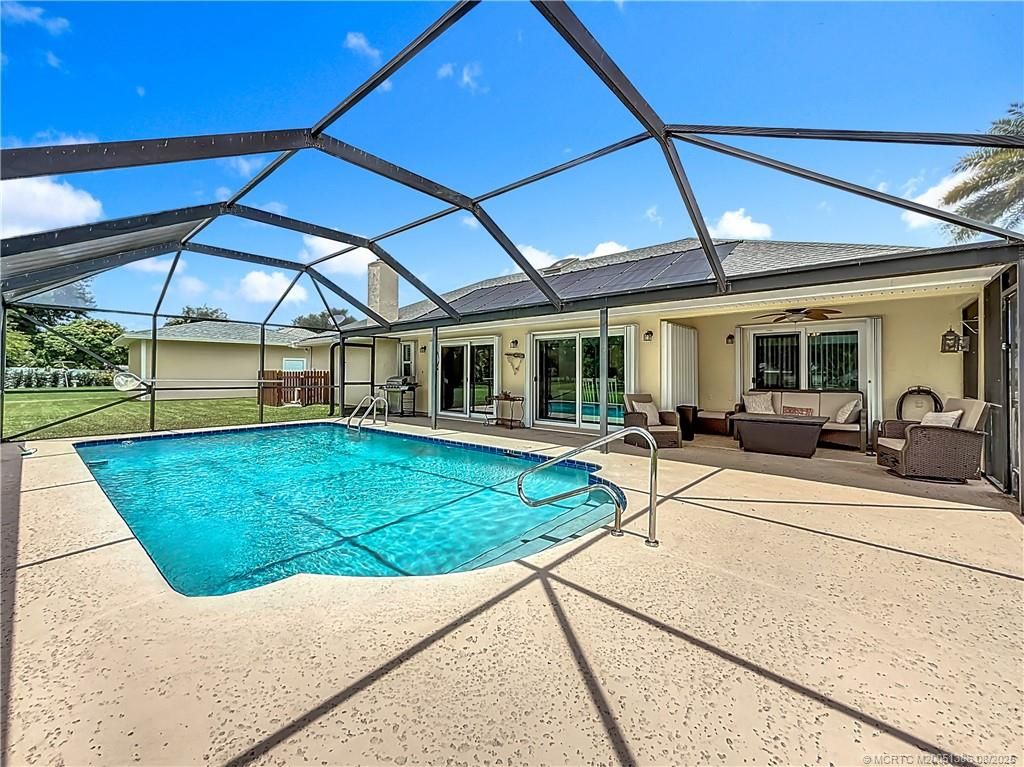 Photo of 2082 SE Pyramid Road, Port Saint Lucie, FL 34952 (MLS # M20051386)