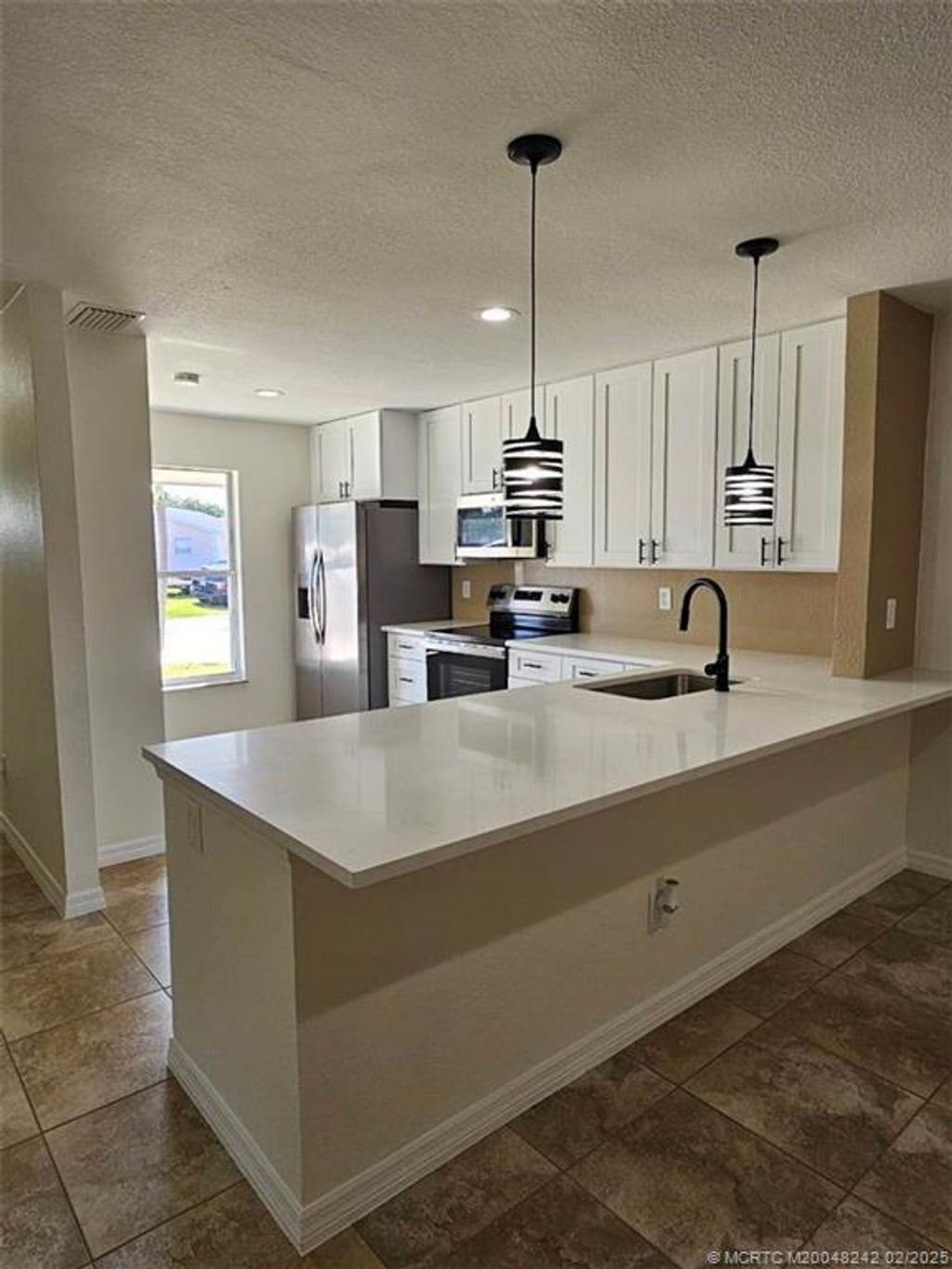 Photo of 4451 Village Road SE, Stuart, FL 34997 (MLS # M20048242)