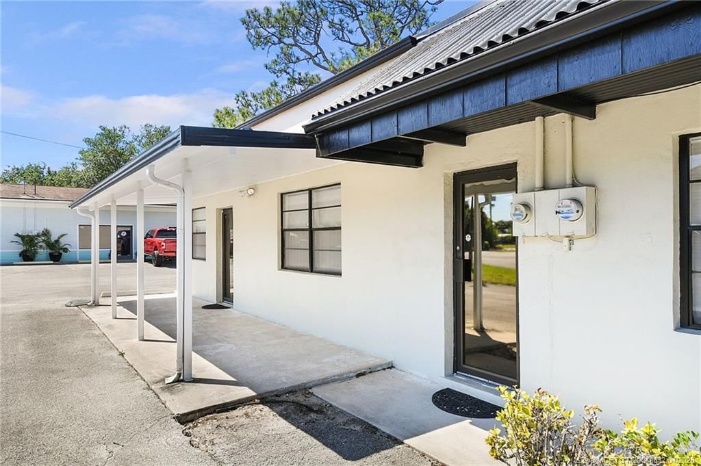 Photo of 940 NE Jensen Beach Boulevard, Jensen Beach, FL 34957 (MLS # M20049832)