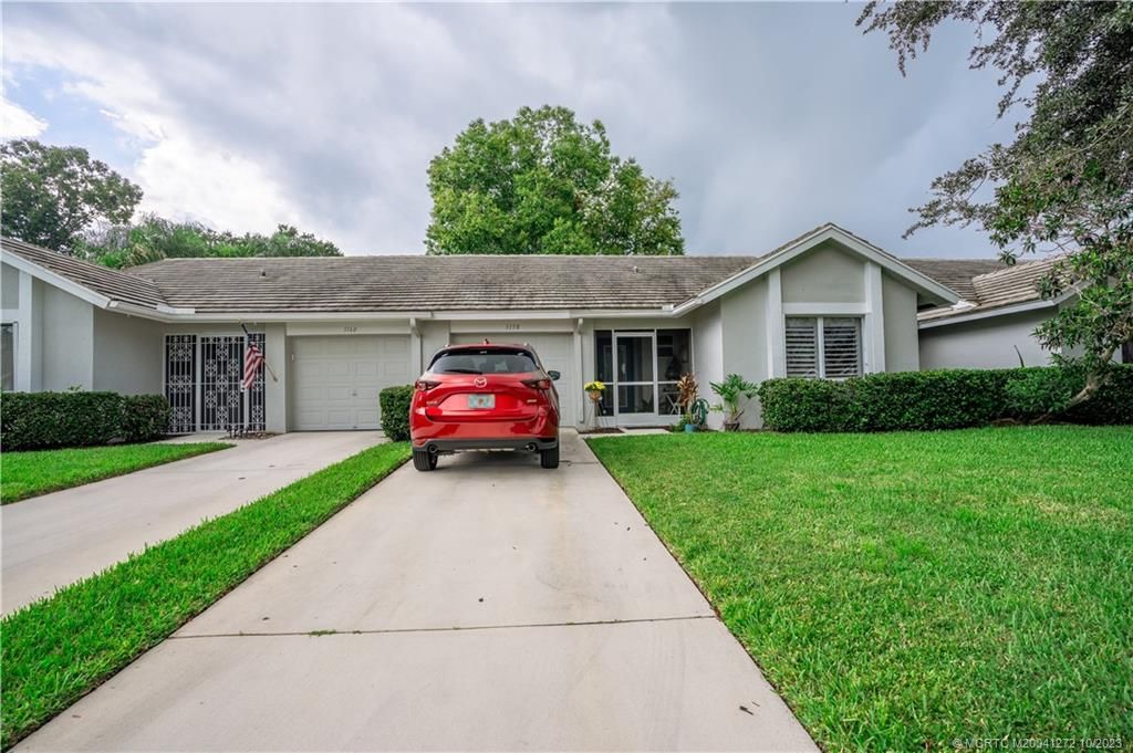 Photo of 3158 SW Sunset Trace Circle, Palm City, FL 34990 (MLS # M20041272)