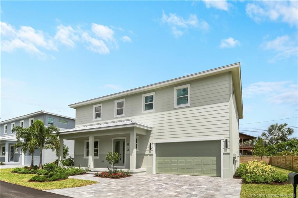 Photo of 1013 NE Orange Avenue, Jensen Beach, FL 34957 (MLS # M20052036)