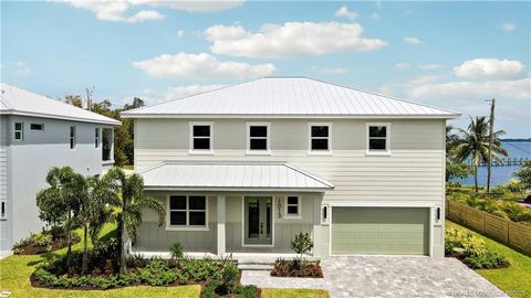 Photo of 1013 NE Orange Avenue, Jensen Beach, FL 34957 (MLS # M20052036)