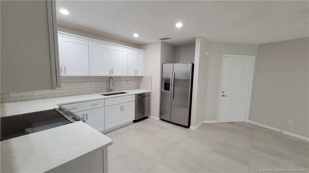 Photo of 2013 NE Collins Circle #4-80, Jensen Beach, FL 34957 (MLS # M20041047)