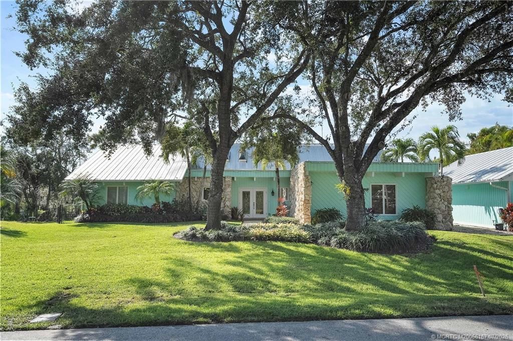 Photo of 220 SW Willow Lake Trail, Stuart, FL 34997 (MLS # M20056167)