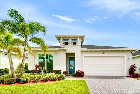 Photo of 607 SE Mulberry Way, Port Saint Lucie, FL 34984 (MLS # M20054166)