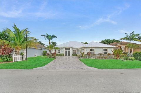 Photo of 439 NW Sunflower Place, Jensen Beach, FL 34957 (MLS # M20052170)
