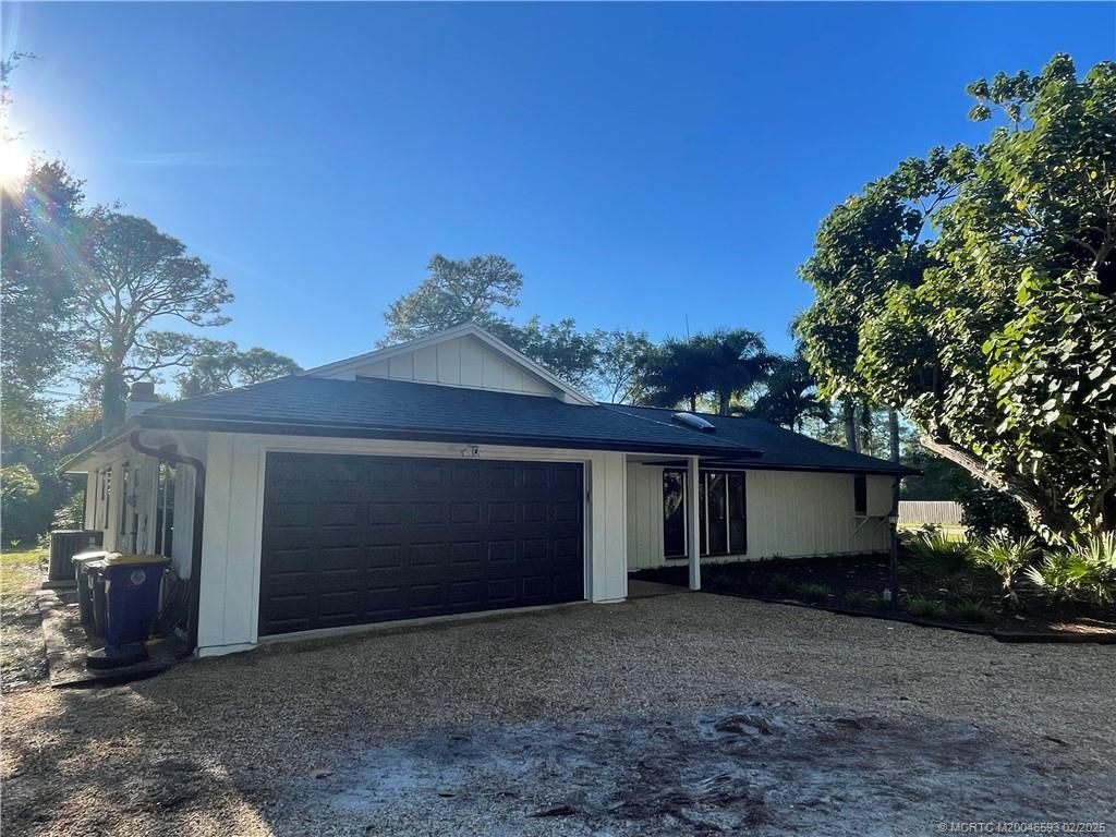 Photo of 8799 SW Tropical Avenue, Stuart, FL 34997 (MLS # M20046593)