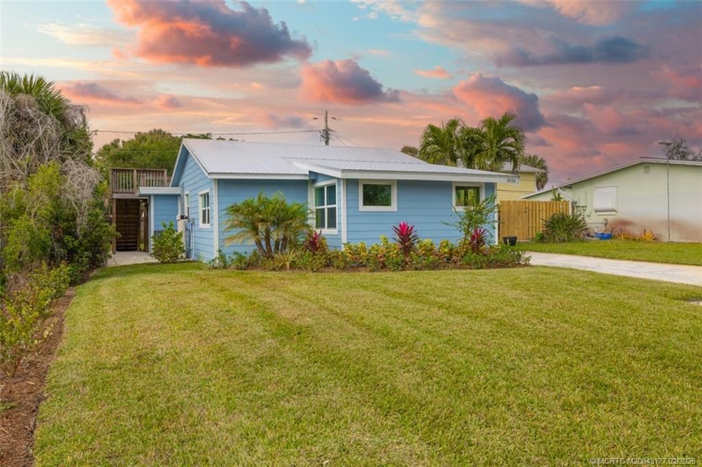 Photo of 1036 NE Wright Avenue, Jensen Beach, FL 34957 (MLS # M20049177)