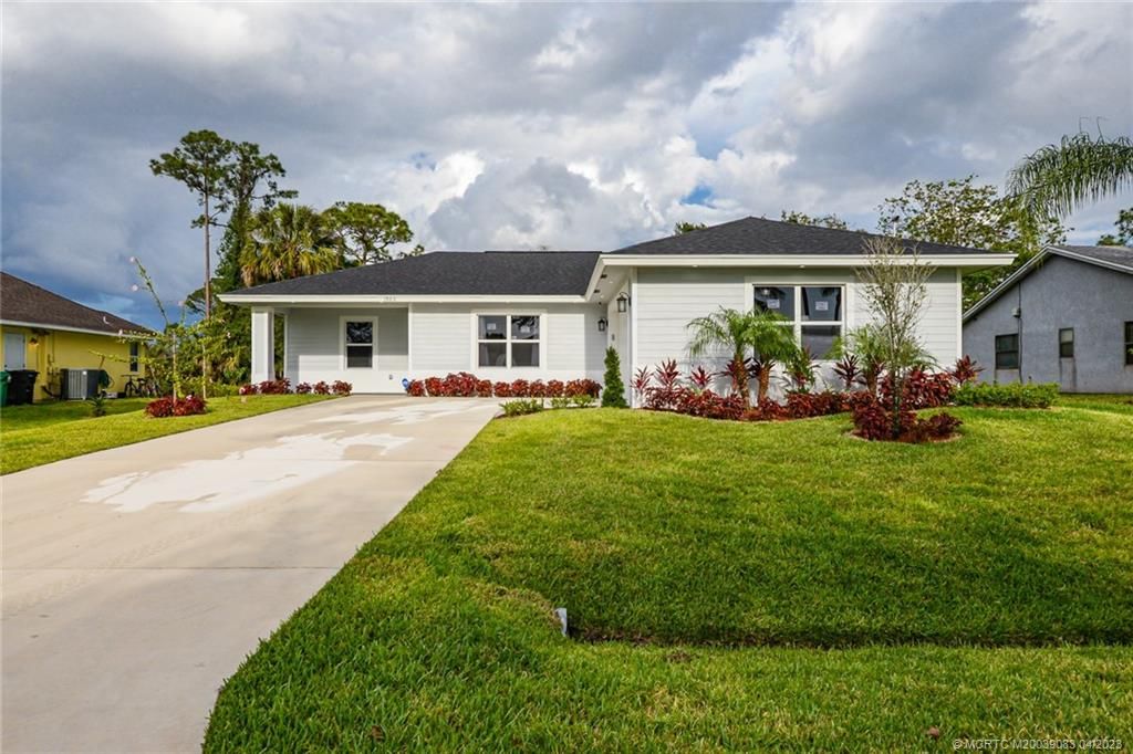 Photo of 1920 SW Logwood Road, Port Saint Lucie, FL 34953 (MLS # M20039083)