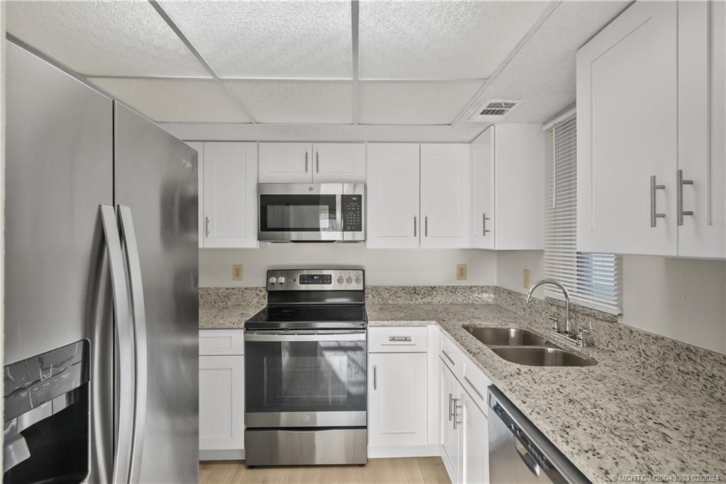 Photo of 1502 SE Royal Green Circle #202, Port Saint Lucie, FL 34952 (MLS # M20043303)