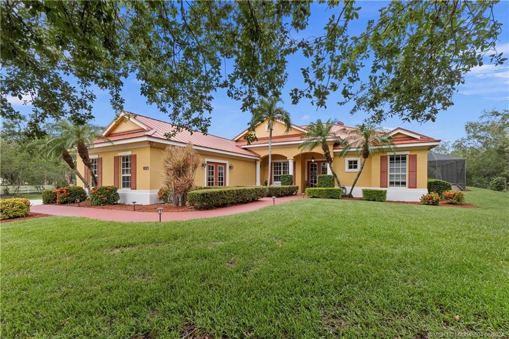 Photo of 9857 SW Pueblo Terrace, Palm City, FL 34990 (MLS # M20045504)