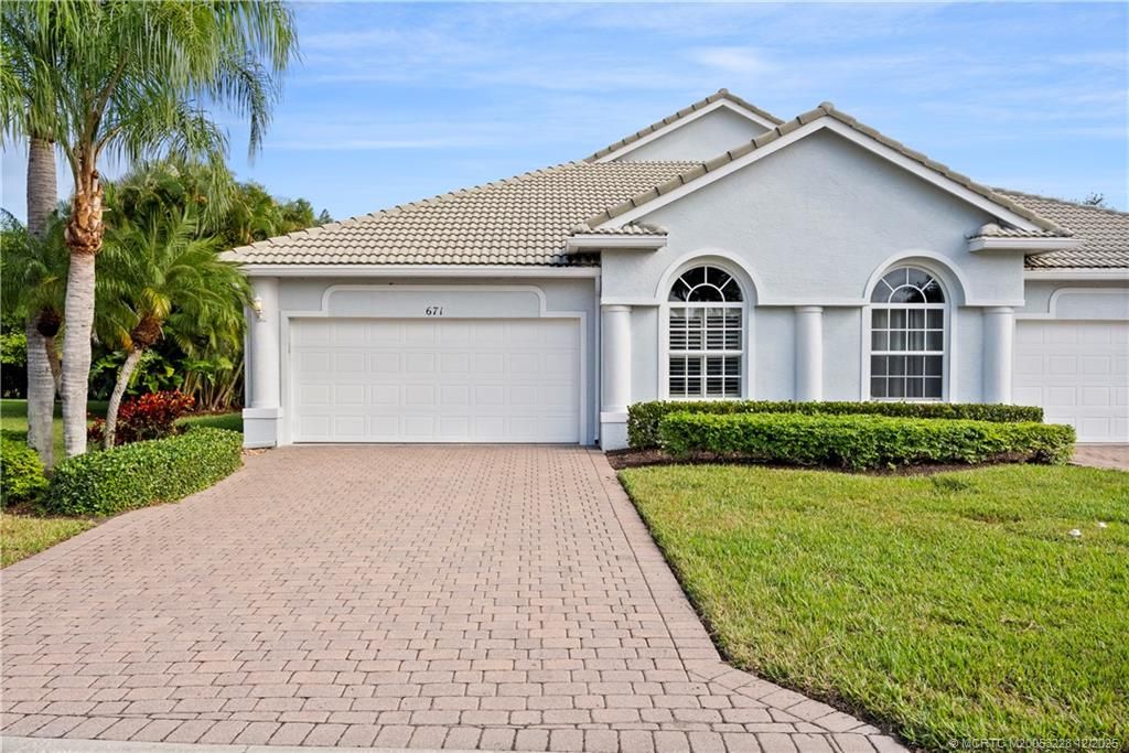 Photo of 671 NW Red Pine Way, Jensen Beach, FL 34957 (MLS # M20053228)