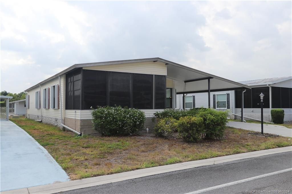 Photo of 16221 SW Indianwood Circle, Indiantown, FL 34956 (MLS # M20045326)