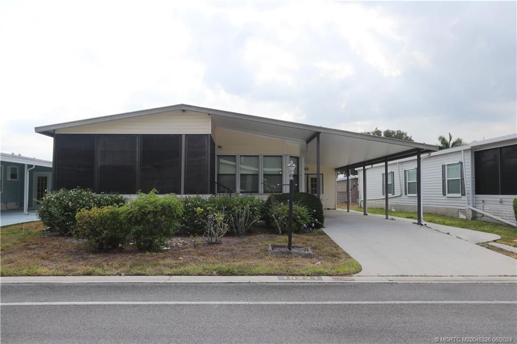 Photo of 16221 SW Indianwood Circle, Indiantown, FL 34956 (MLS # M20045326)