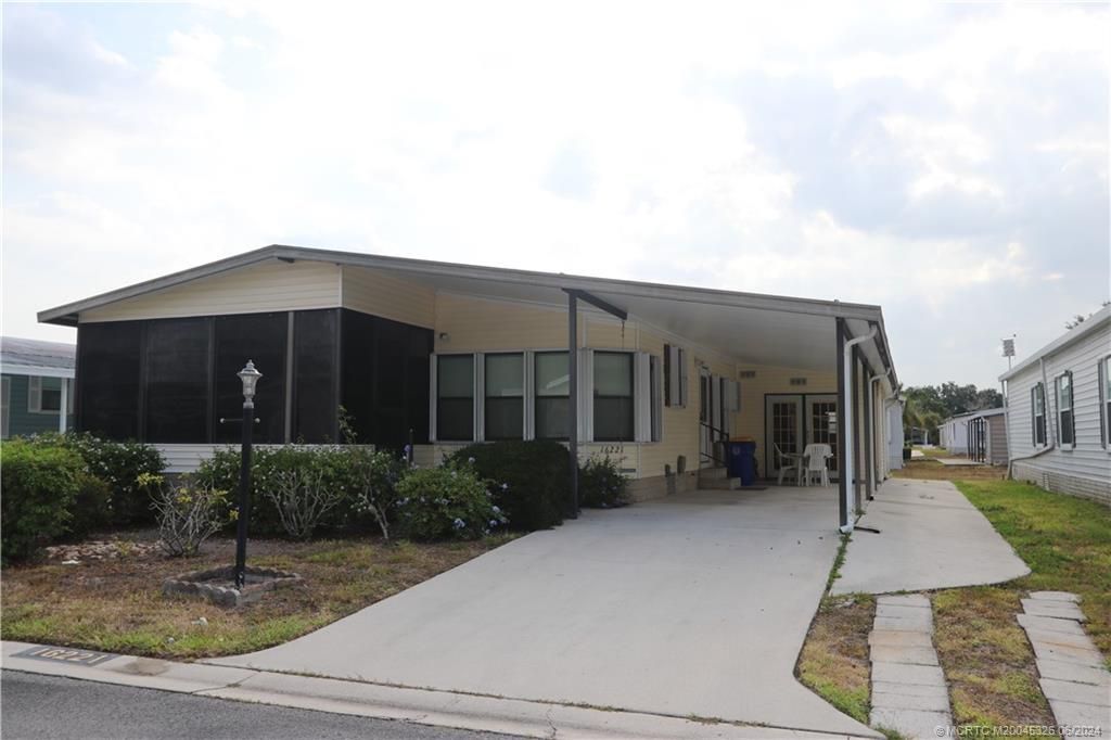 Photo of 16221 SW Indianwood Circle, Indiantown, FL 34956 (MLS # M20045326)