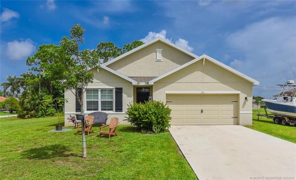 Photo of 991 SW Fable Avenue, Port Saint Lucie, FL 34953 (MLS # M20047258)