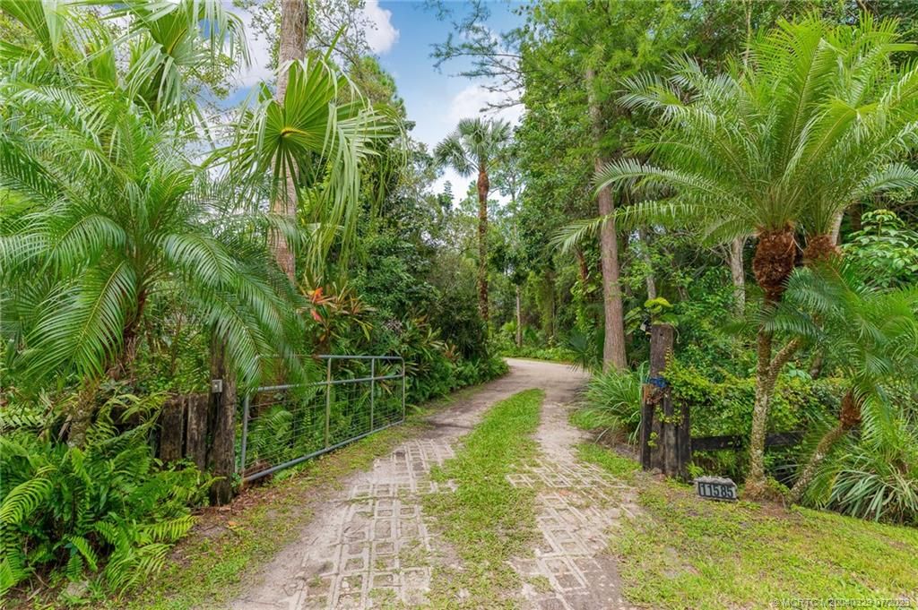 Photo of 11585 162nd Place N, Jupiter, FL 33478 (MLS # M20040329)