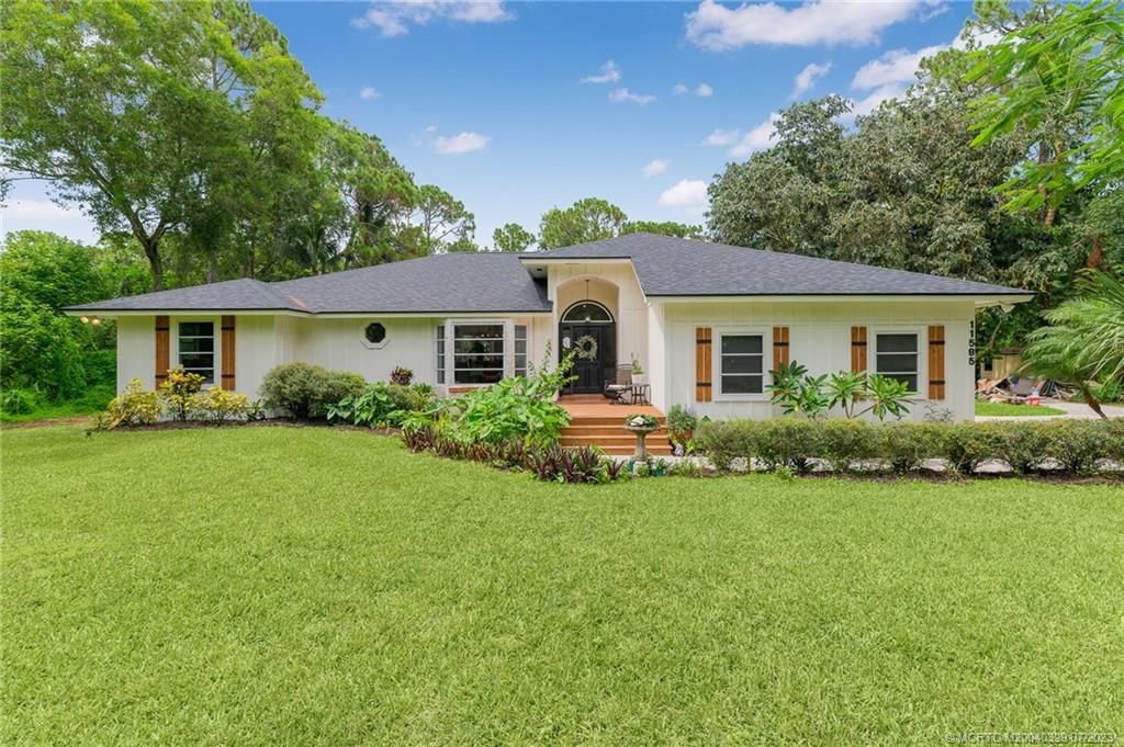 Photo of 11585 162nd Place N, Jupiter, FL 33478 (MLS # M20040329)