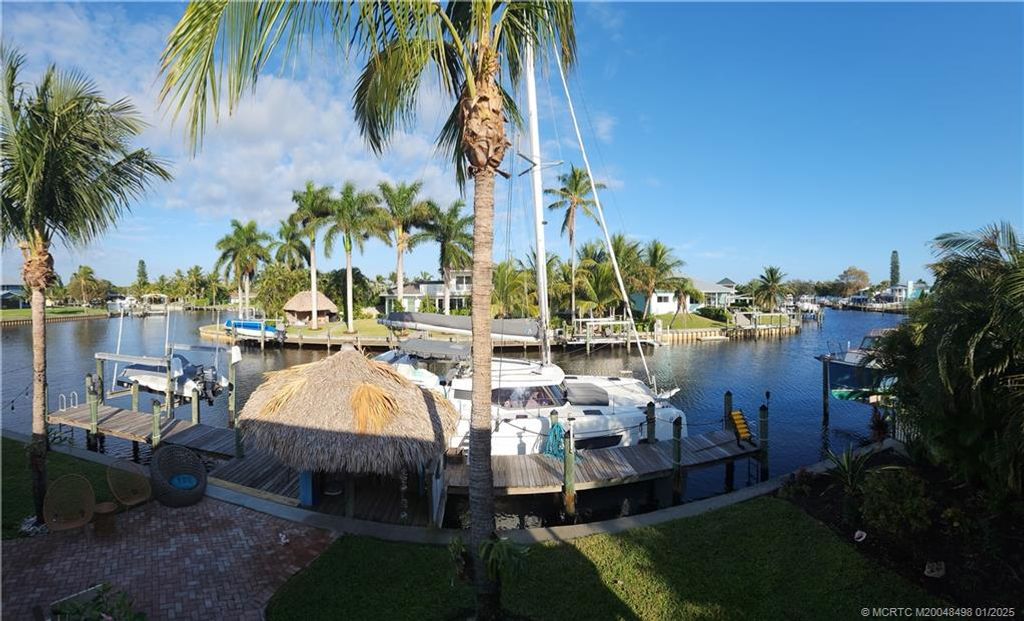 Photo of 1565 SW Egret Way, Palm City, FL 34990 (MLS # M20048498)