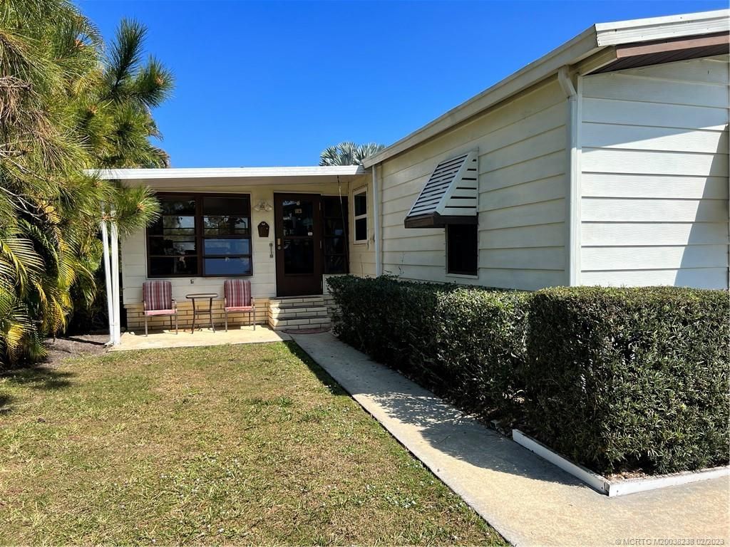 Photo of 8570 Mary Ann Lane #12, Port Saint Lucie, FL 34952 (MLS # M20038238)