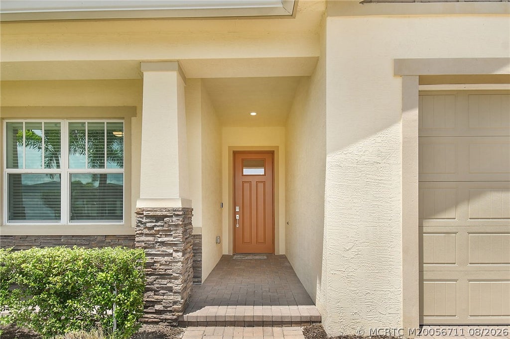 Photo of 396 SE Mulberry Way, Port Saint Lucie, FL 34984 (MLS # M20056711)