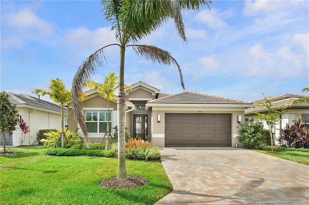 Photo of 11933 SW Coral Cove Parkway, Port Saint Lucie, FL 34987 (MLS # M20054757)