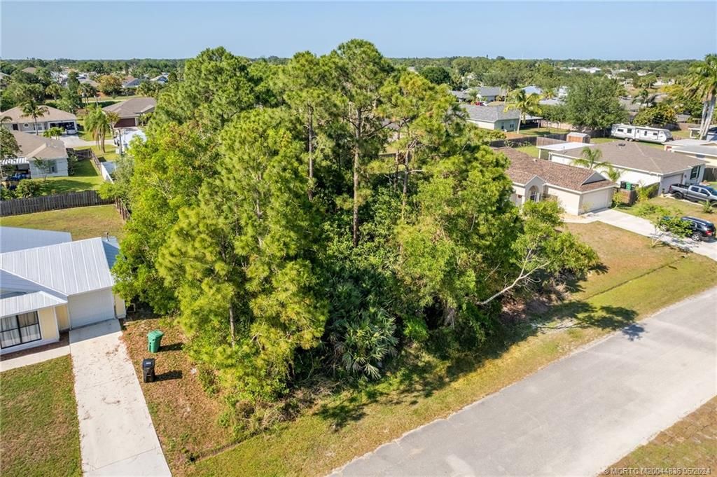 Photo of 565 SW Fairview Avenue, Port Saint Lucie, FL 34983 (MLS # M20044836)