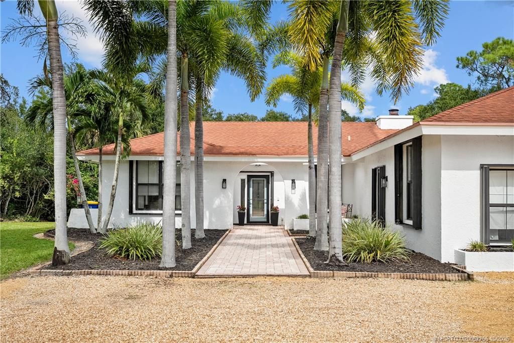 Photo of 1733 SW Crane Creek Avenue, Palm City, FL 34990 (MLS # M20052766)